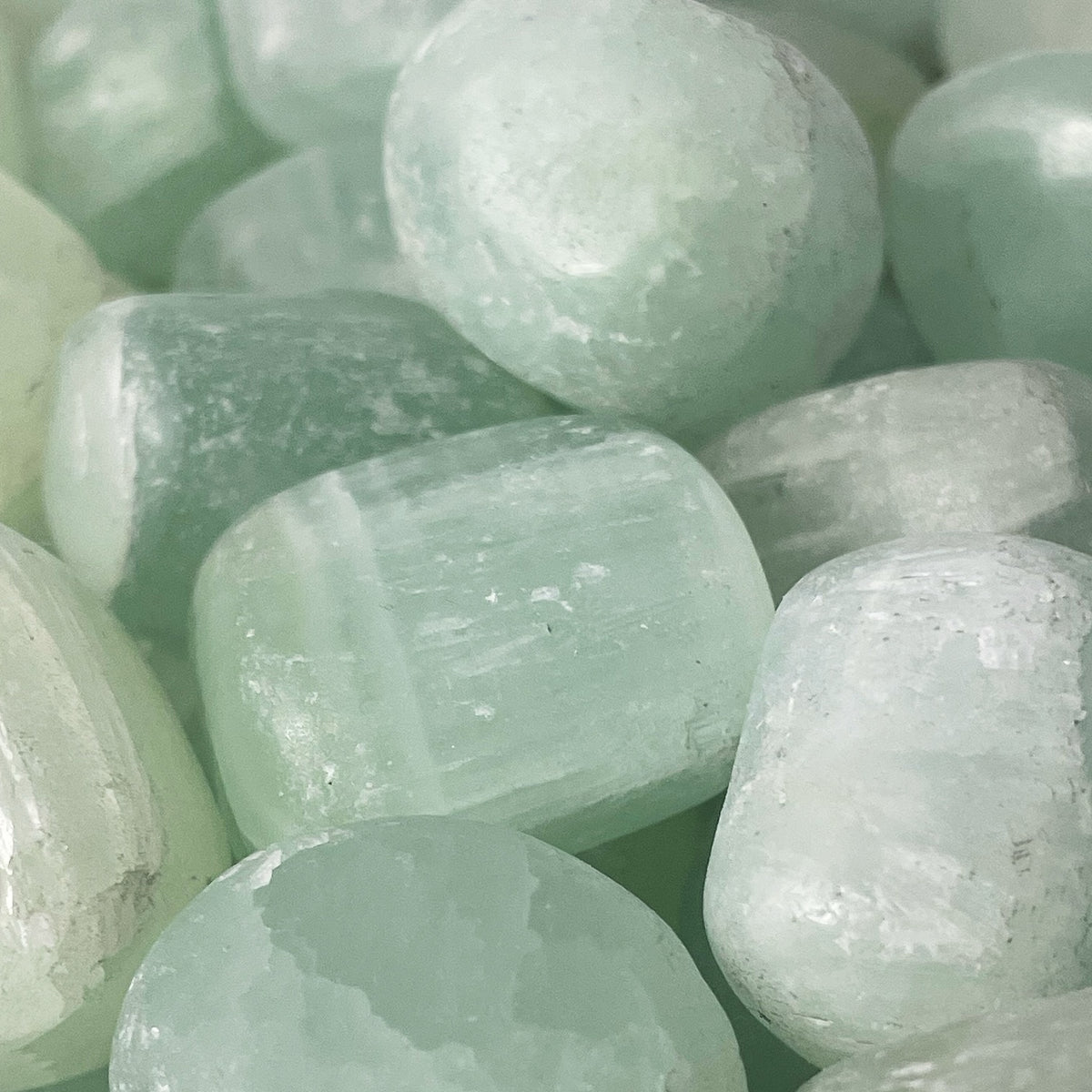 Pistachio Calcite tumble, calcium carbonate.