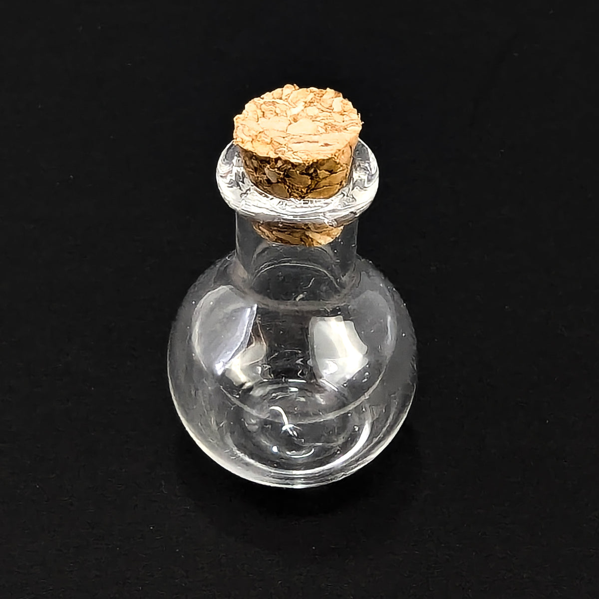 Potion Bottle display, made of cork and glass.