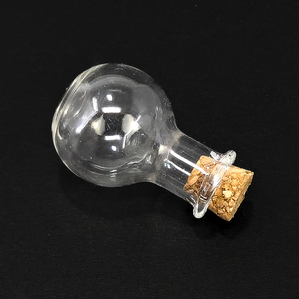 Potion Bottle display, made of cork and glass.