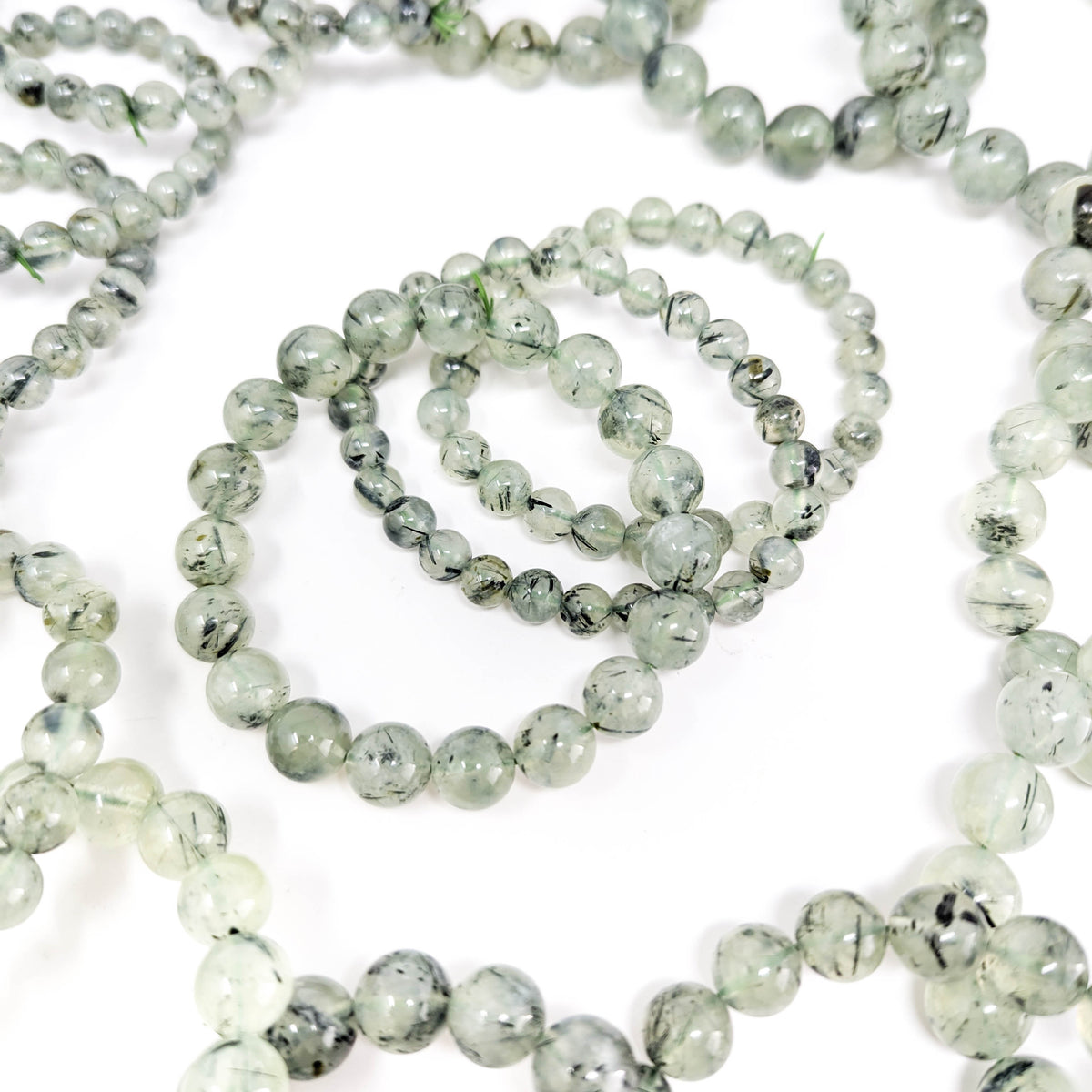 Prehnite with Tourmaline round bead bracelet.