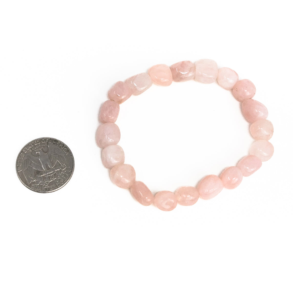 Rose quartz tumbled bead bracelet – single bracelet beside a coin for scale