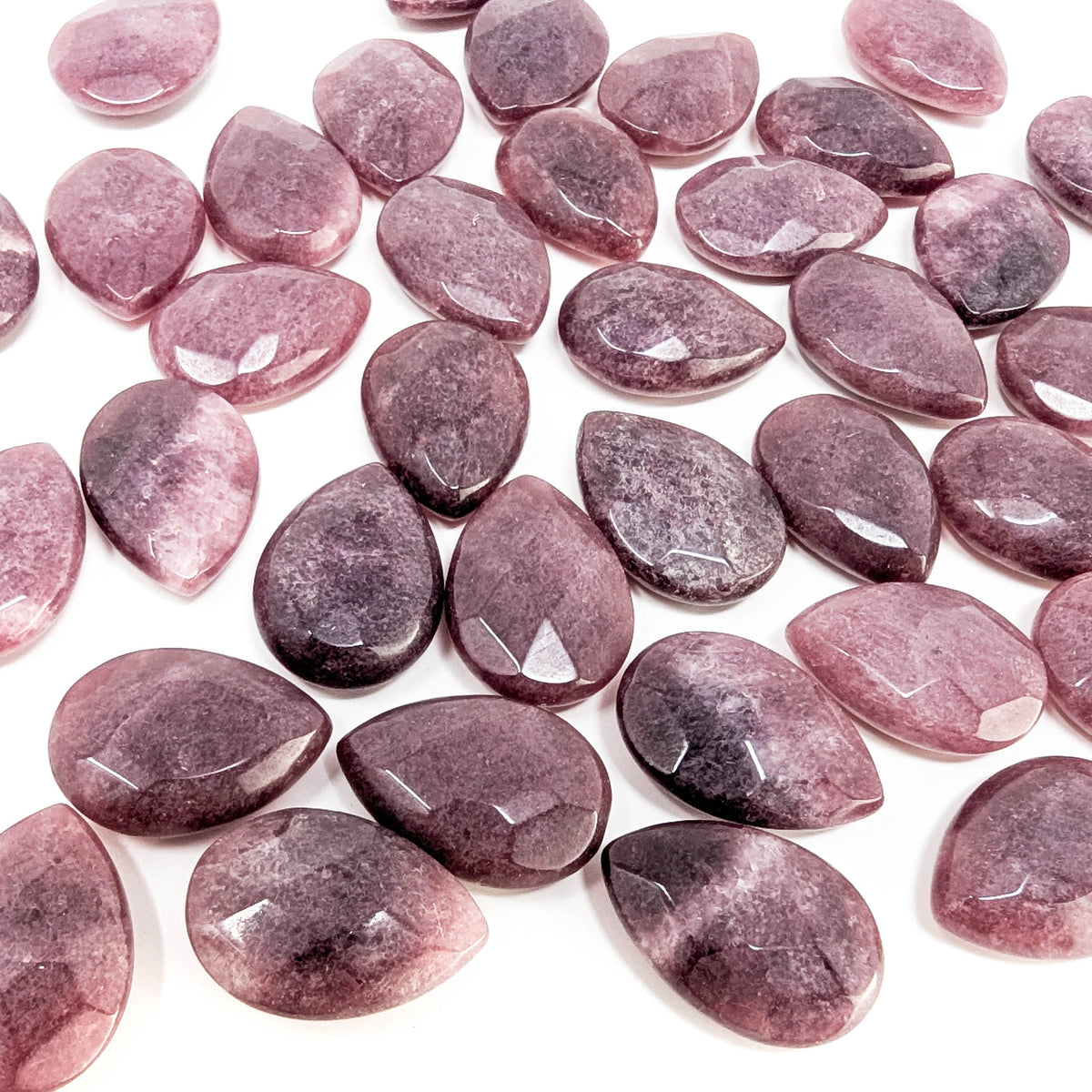 Faceted ruby teardrop from Mozambique – spread of teardrops