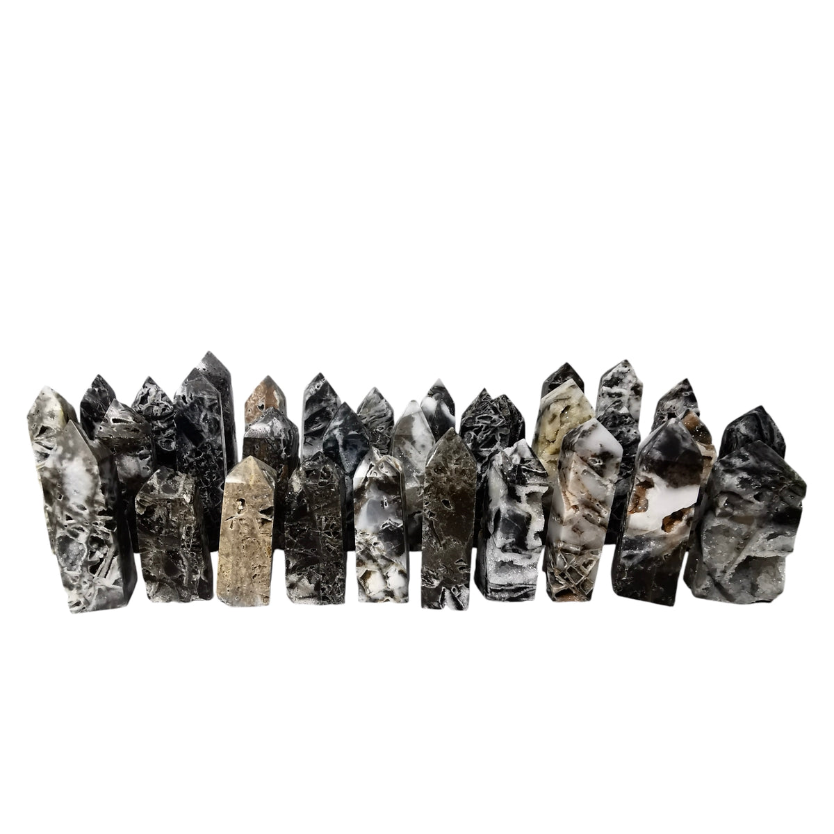 Snow Agate obelisk, a variety of chalcedony.