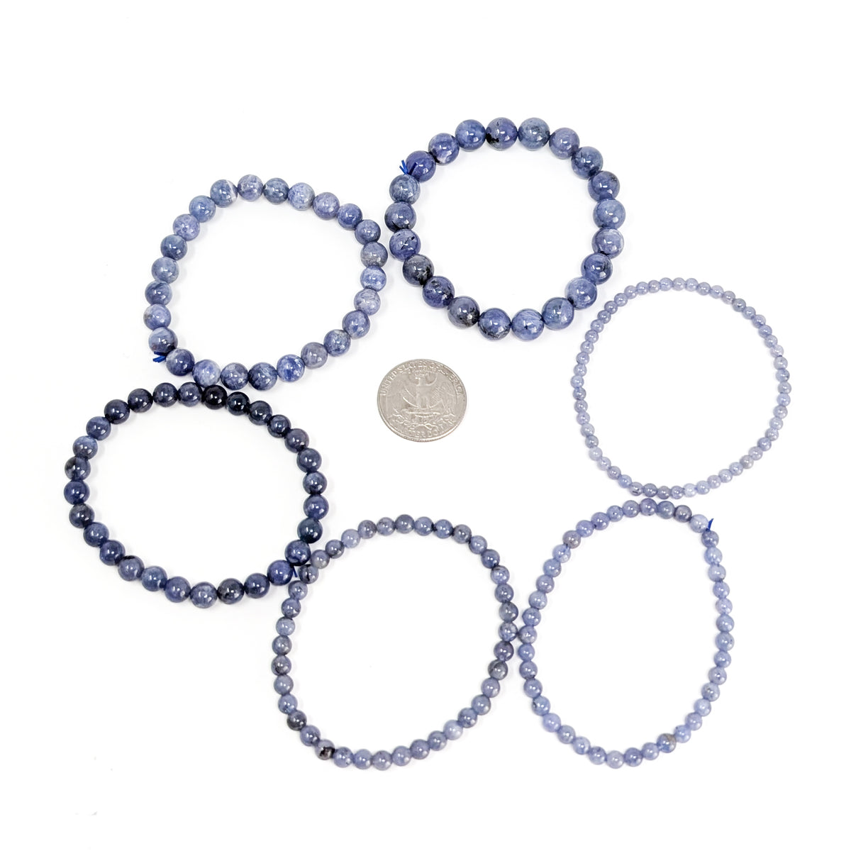 Tanzanite bead bracelet – size range beside a coin for scale