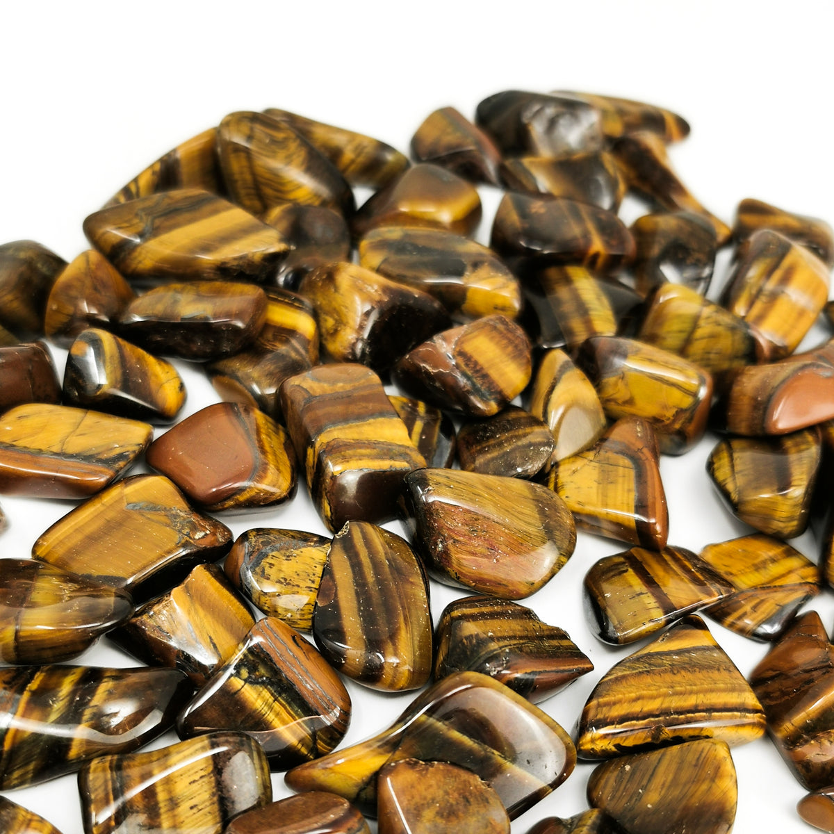 Tigers Eye tumble, a variety of quartz.
