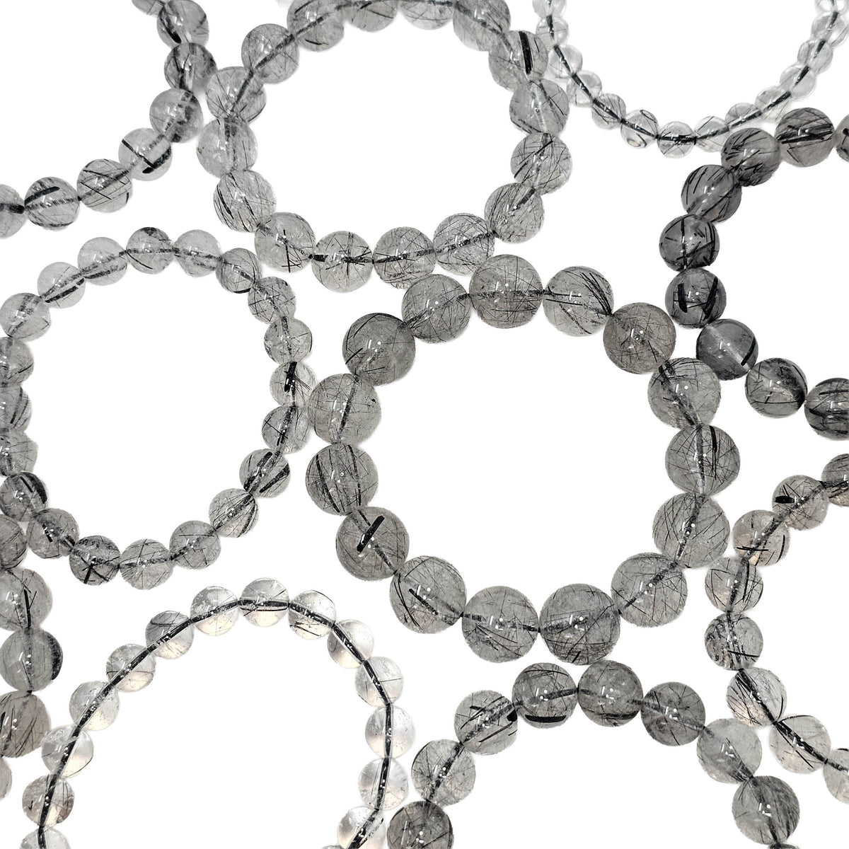 Tourmalinated Quartz round bead bracelet.