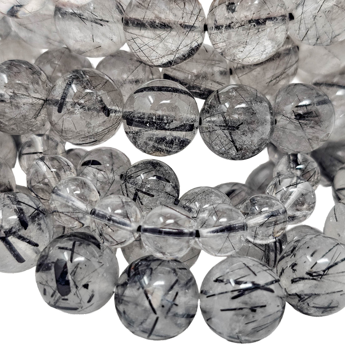 Tourmalinated Quartz round bead bracelet.