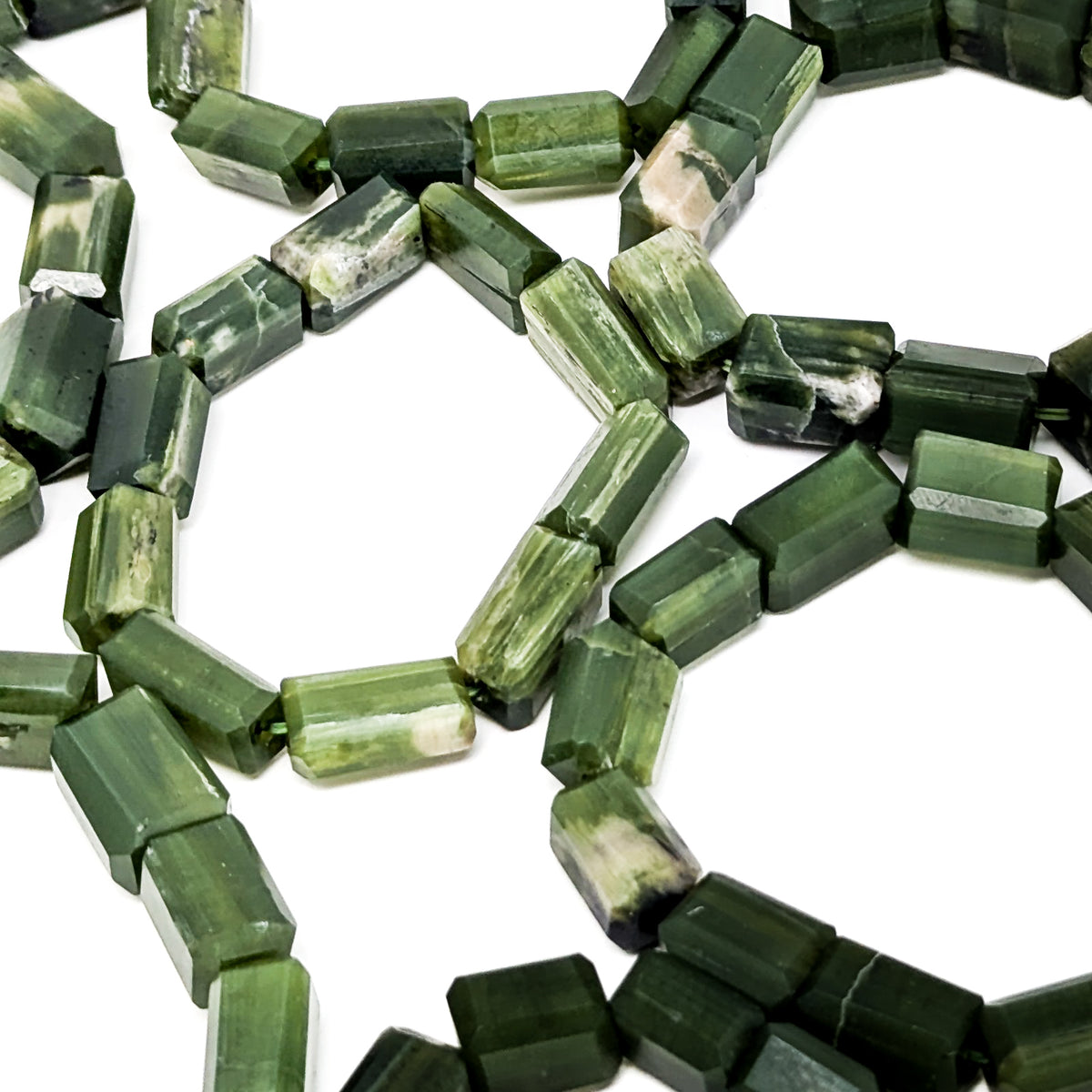 Tremolite bead bracelet from Pakistan – close-up of strands of beads