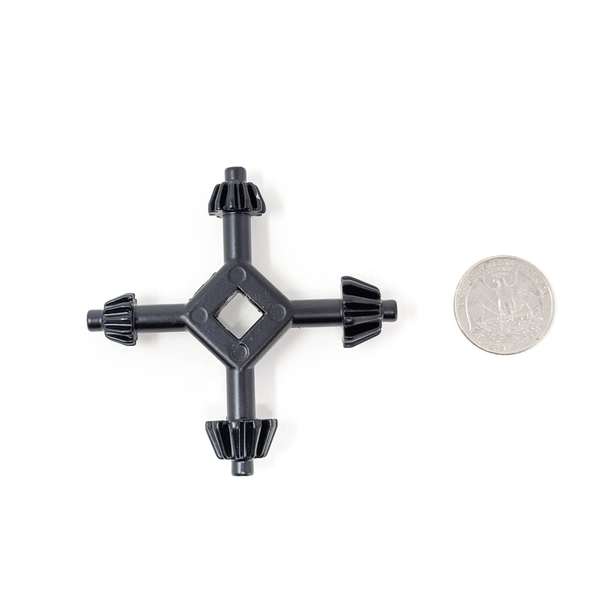 Universal drill chuck key – key beside a coin for scale