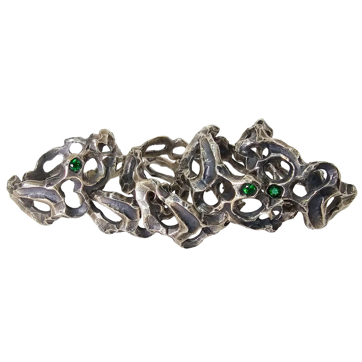 Caturix organic ring in sterling silver with Tsavorite Green Garnet.