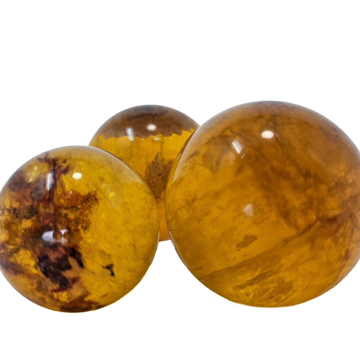 Yellow fluorite sphere from China – group with inclusions