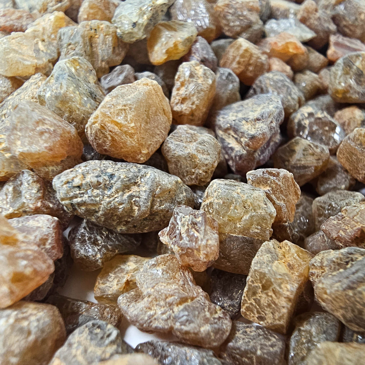 Yellow sapphire rough from Madagascar – close-up of many pieces