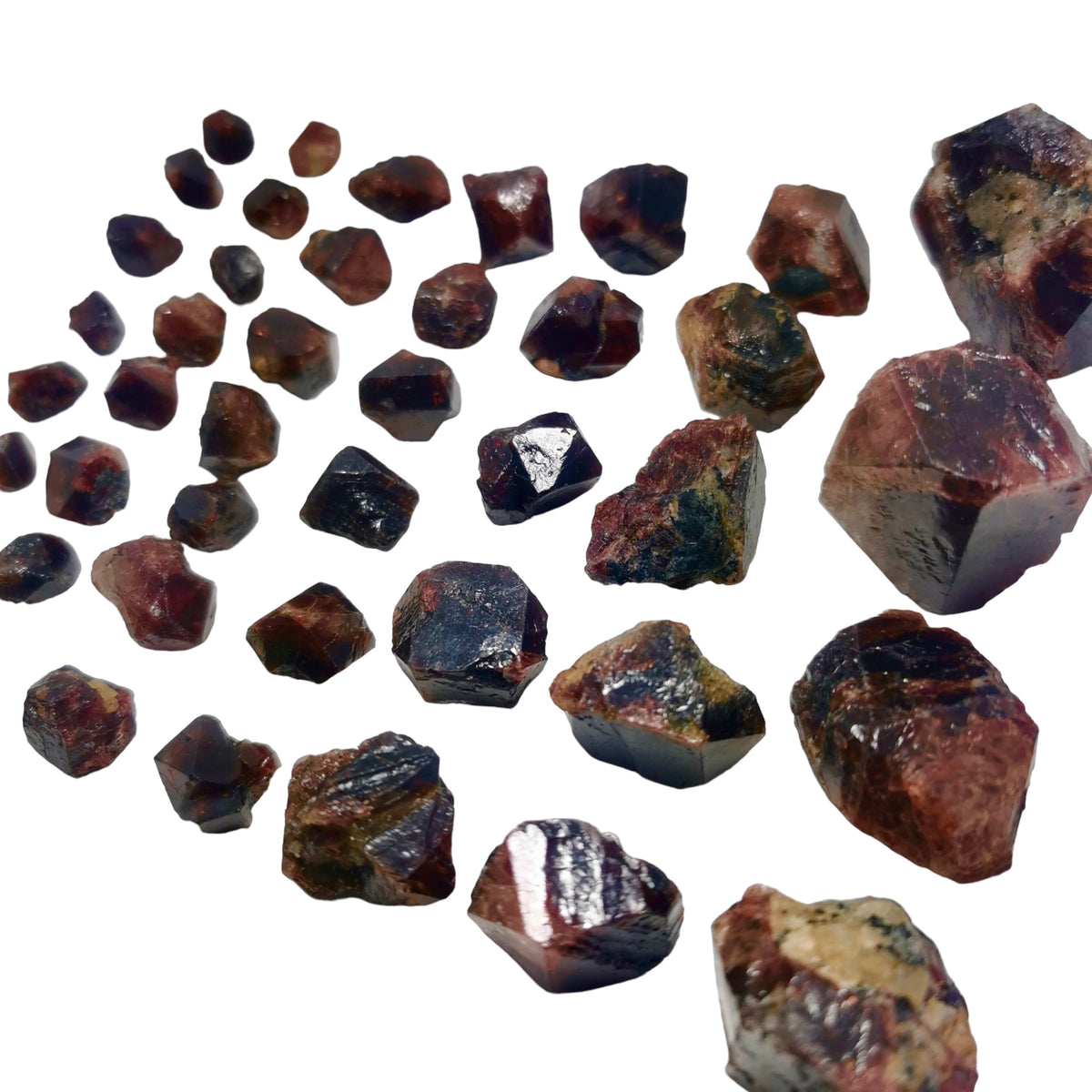 Red zircon crystal from Pakistan – spread of many crystals