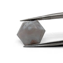 Agate faceted hexagon gemstone, 5.34ct, from BC, Canada, held in tweezers, view 8 of 10