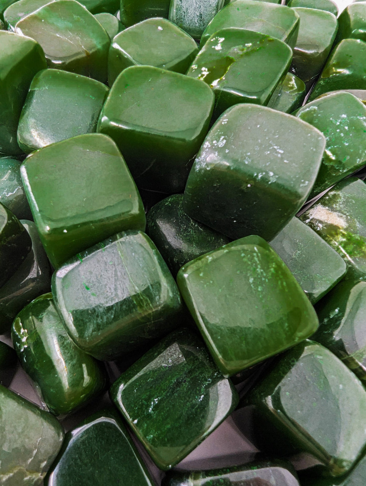 BC jade (nephrite) gloss finish tumbled stones from Northern British Columbia, Canada, grade A, close-up, view 1 of 8