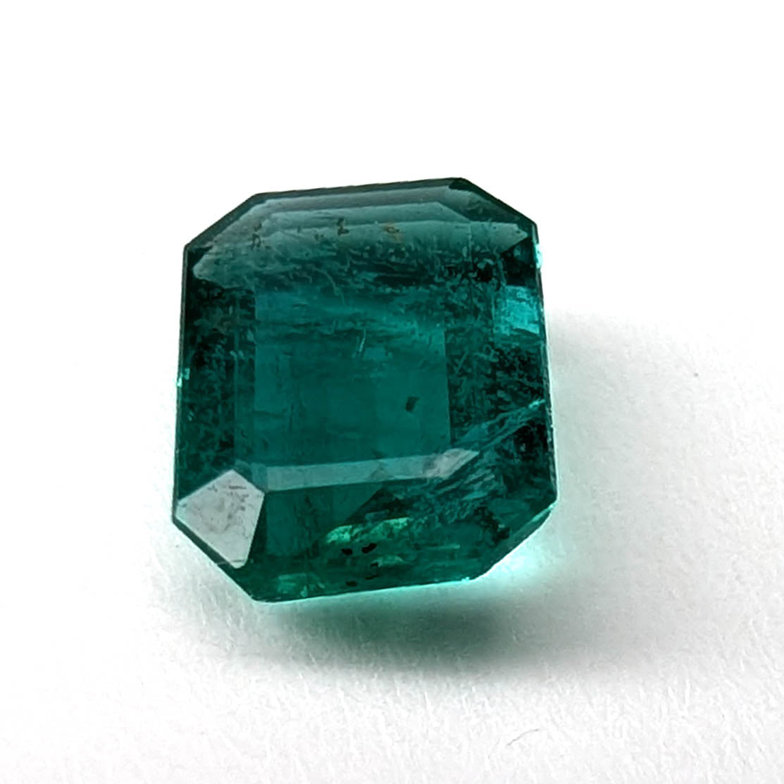 Emerald faceted emerald cut gemstone, 1.09ct, main view, view 1 of 11