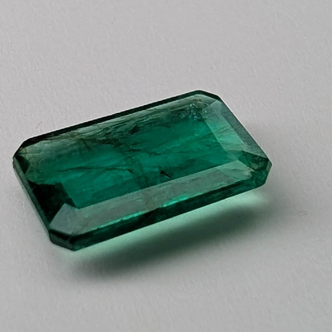 Emerald faceted emerald cut gemstone, 2.04ct, alternate angle, view 3 of 11