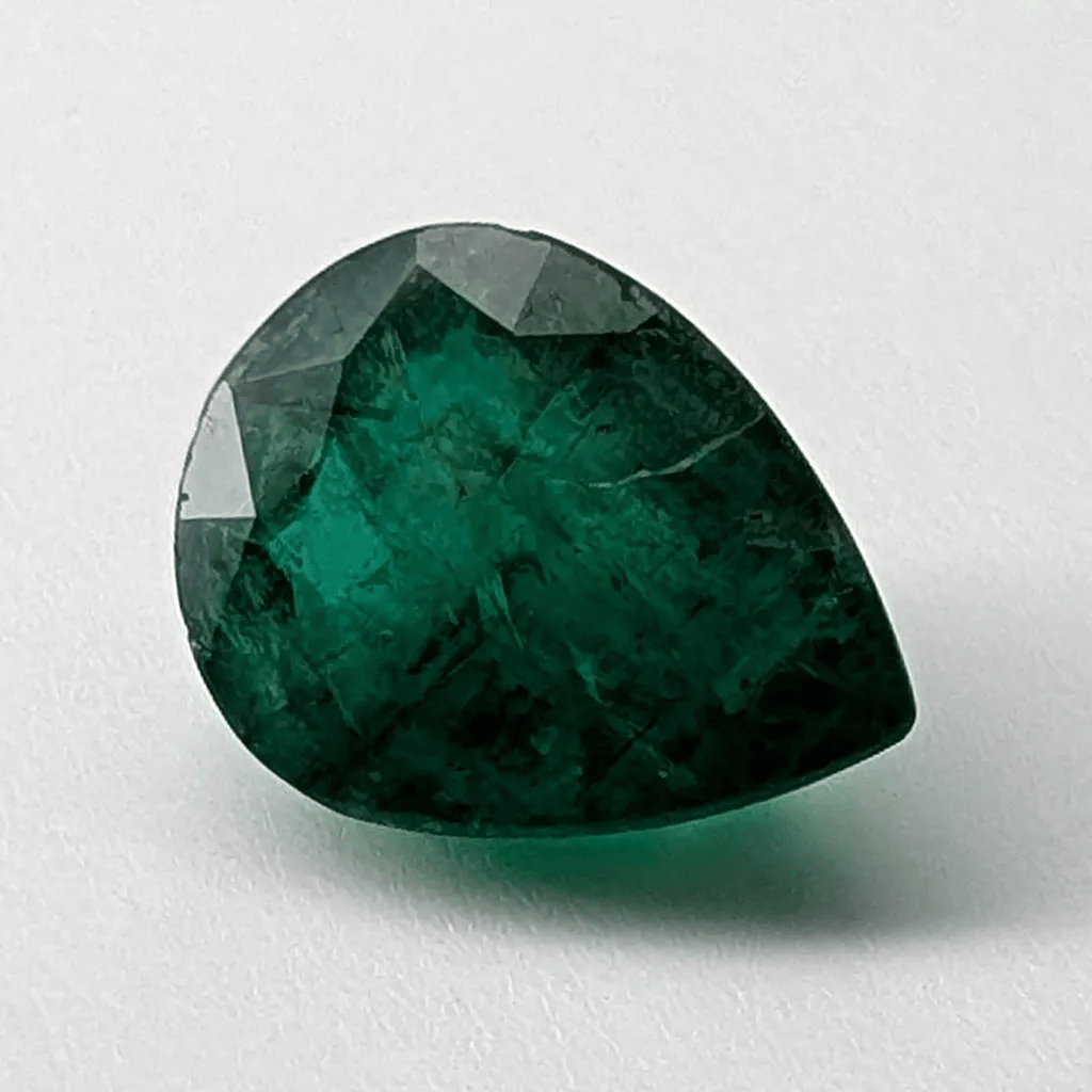 Emerald faceted pear cut gemstone, 3.60ct, rotating view