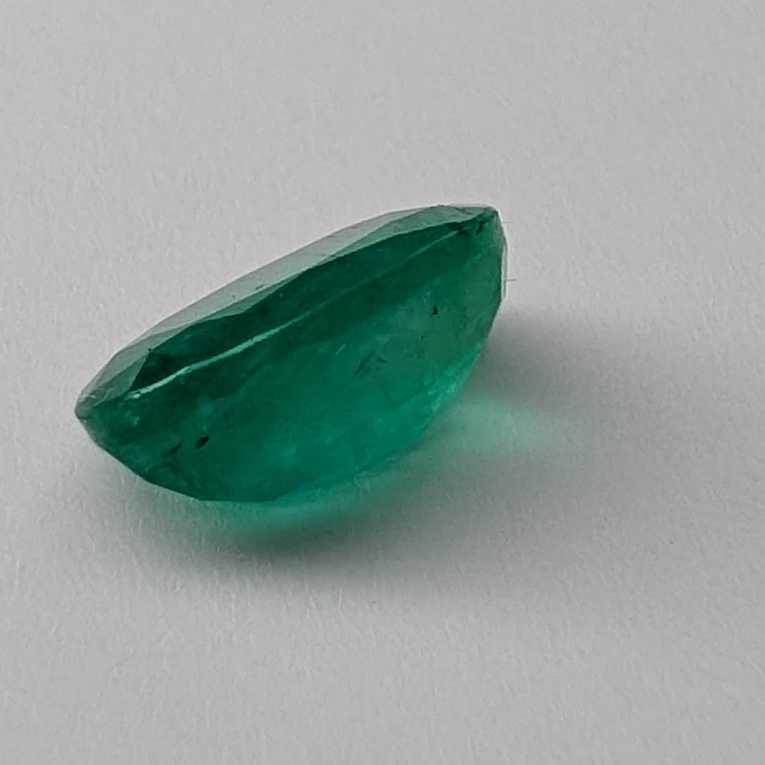 Emerald faceted oval cut gemstone, 2.43ct, alternate angle, view 5 of 7