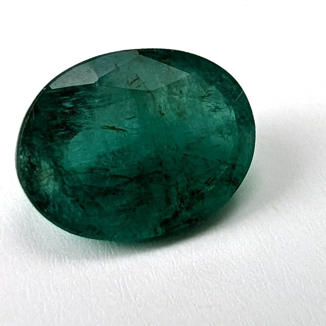 Emerald faceted oval cut gemstone, 2.53ct, alternate angle, view 8 of 13