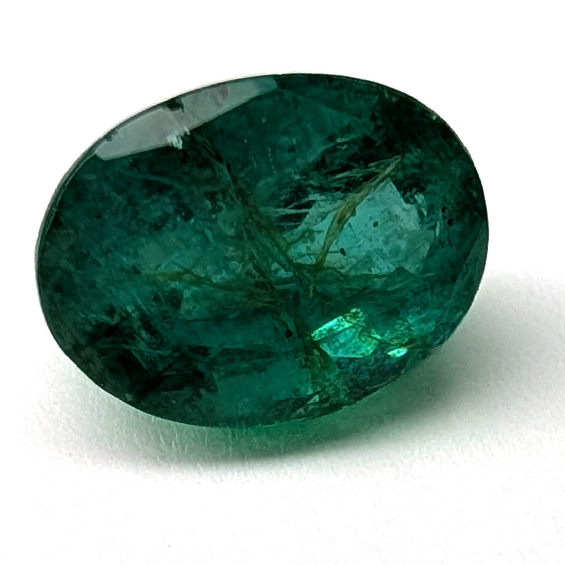 Emerald faceted oval cut gemstone, 3.22ct, main view, view 1 of 12