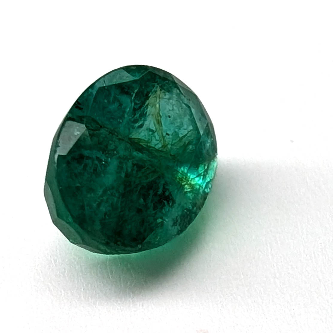 Emerald faceted oval cut gemstone, 3.22ct, alternate angle, view 9 of 12