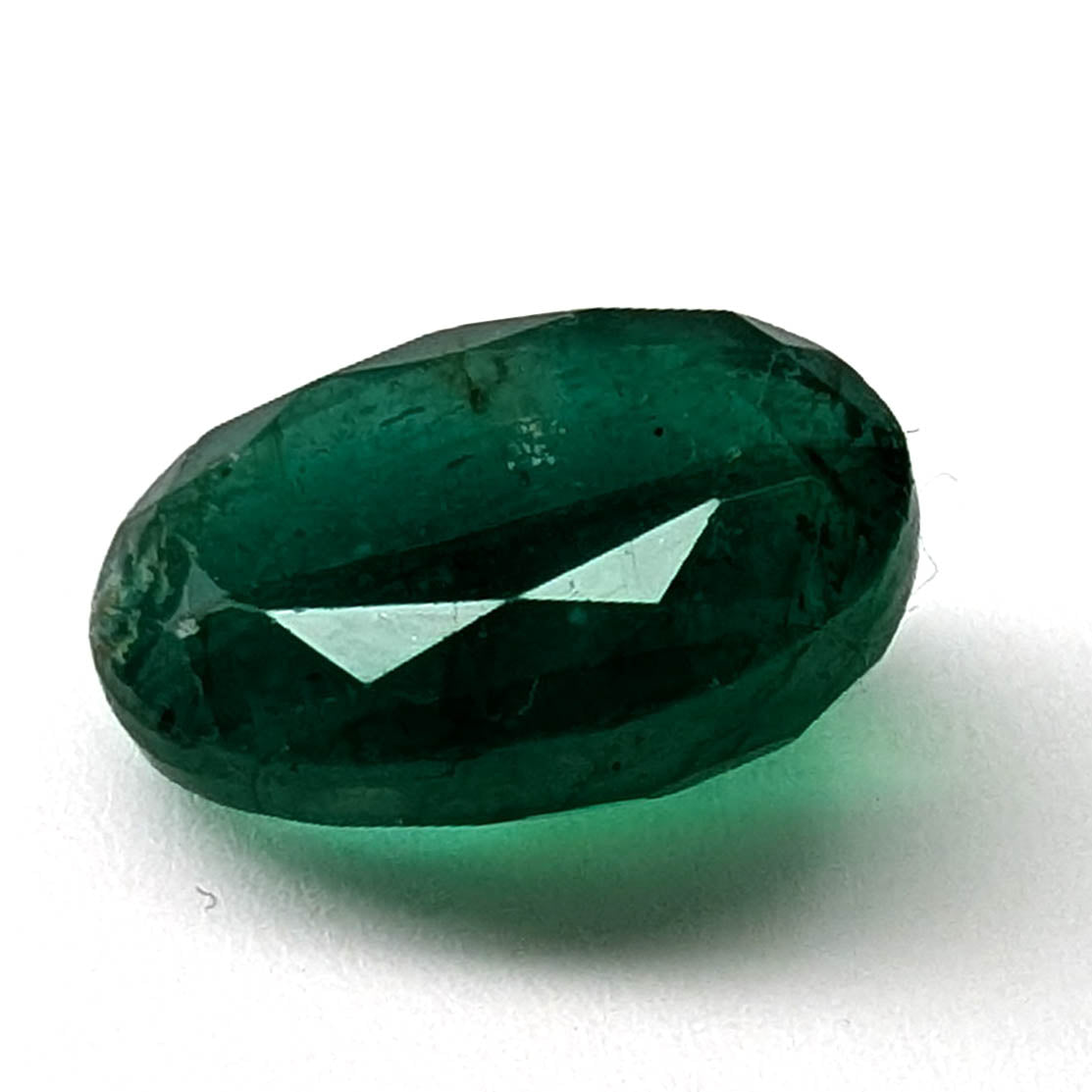 Emerald faceted oval cut gemstone, 3.84ct, alternate angle, view 4 of 9