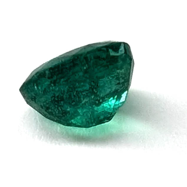 Emerald faceted oval gemstone, 0.73ct, side profile, view 6 of 10