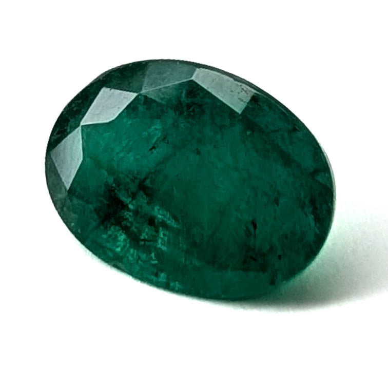 Emerald faceted oval gemstone, 1.92ct, angled view of the crown facets, view 3 of 12