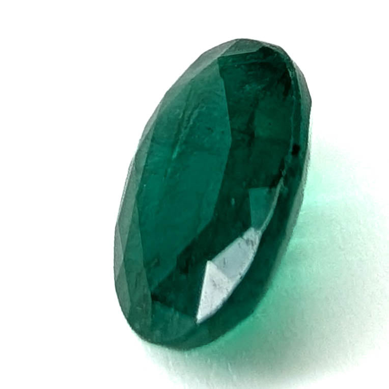 Emerald faceted oval gemstone, 1.92ct, face-up view, long axis upright, view 5 of 12