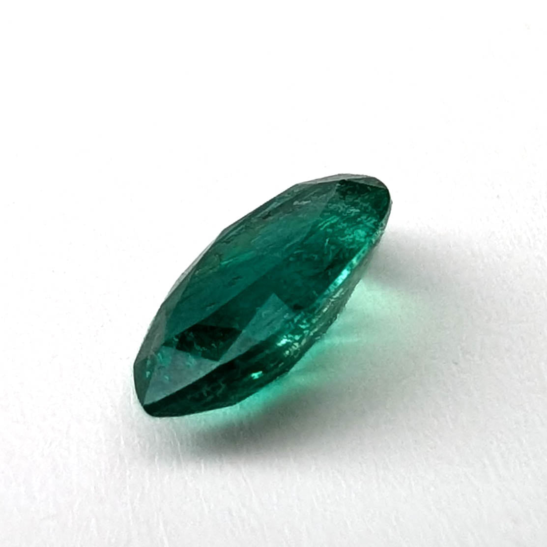 Emerald faceted pear cut gemstone, 0.94ct, alternate angle, view 5 of 10
