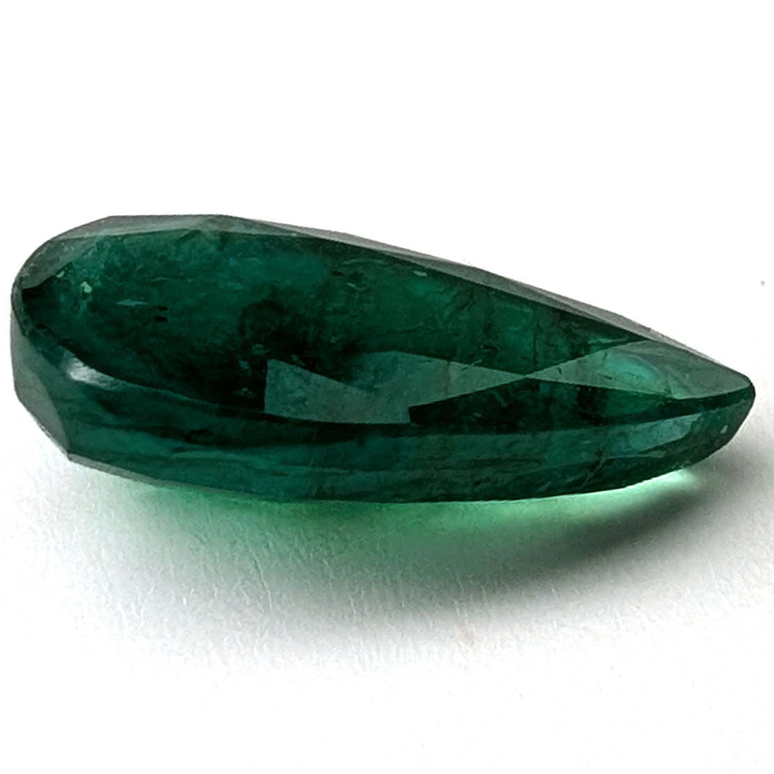 Emerald faceted pear cut gemstone, 3.95ct, alternate angle, view 6 of 13