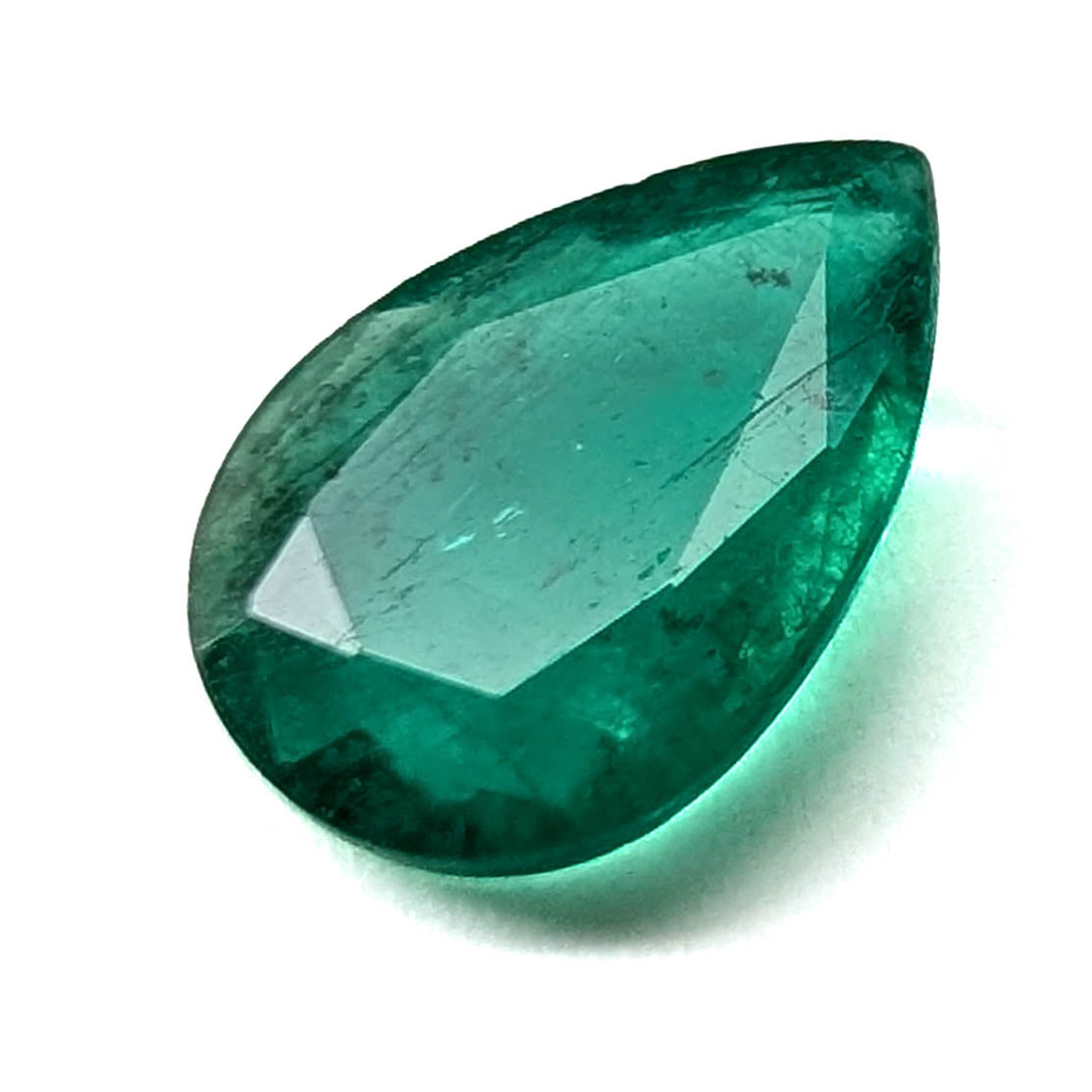 Emerald faceted pear gemstone, 1.60ct, angled face-up view from the other side, view 7 of 11