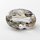 Actinolite quartz faceted oval gemstone, 3.65ct, from Mount Breakenridge, Harrison Lake, BC, Canada, on a white background, view 1 of 11