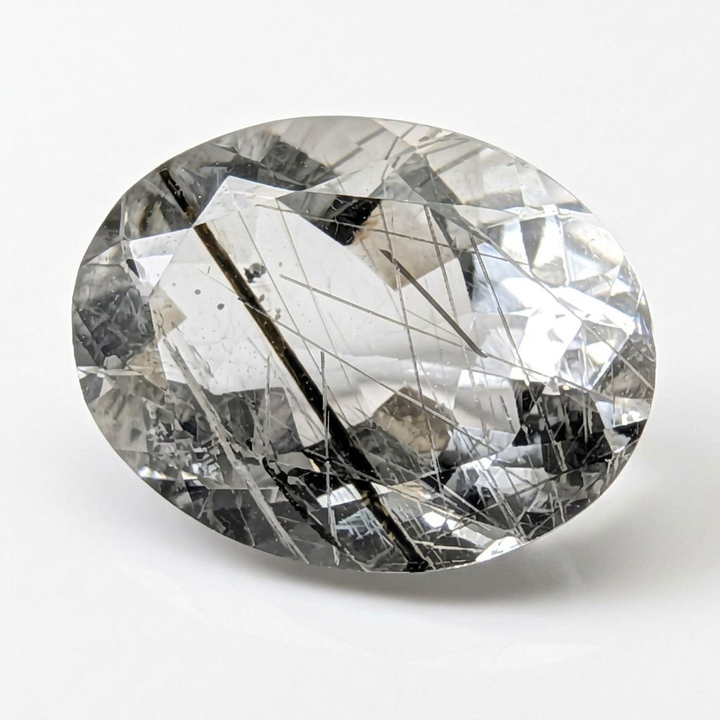 Actinolite quartz faceted oval gemstone, 6.02ct, from Mount Breakenridge, Harrison Lake, BC, Canada, on a white background, view 1 of 14