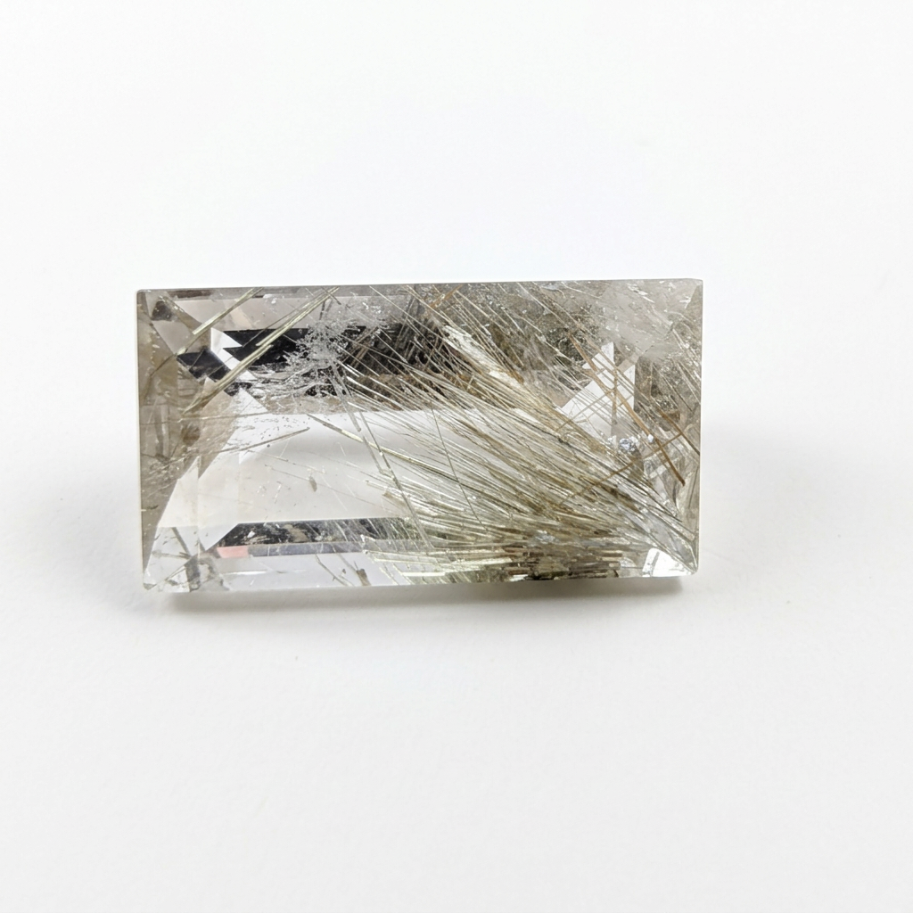 Actinolite quartz faceted rectangle gemstone, 4.30ct, from Mount Breakenridge, Harrison Lake, BC, Canada, on a white background, view 1 of 11