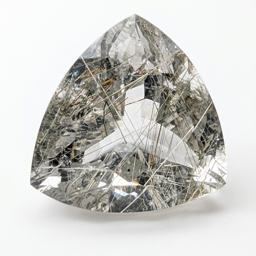 Actinolite quartz faceted trillion gemstone, 13.20ct, from Mount Breakenridge, Harrison Lake, BC, Canada, on a white background, view 1 of 17
