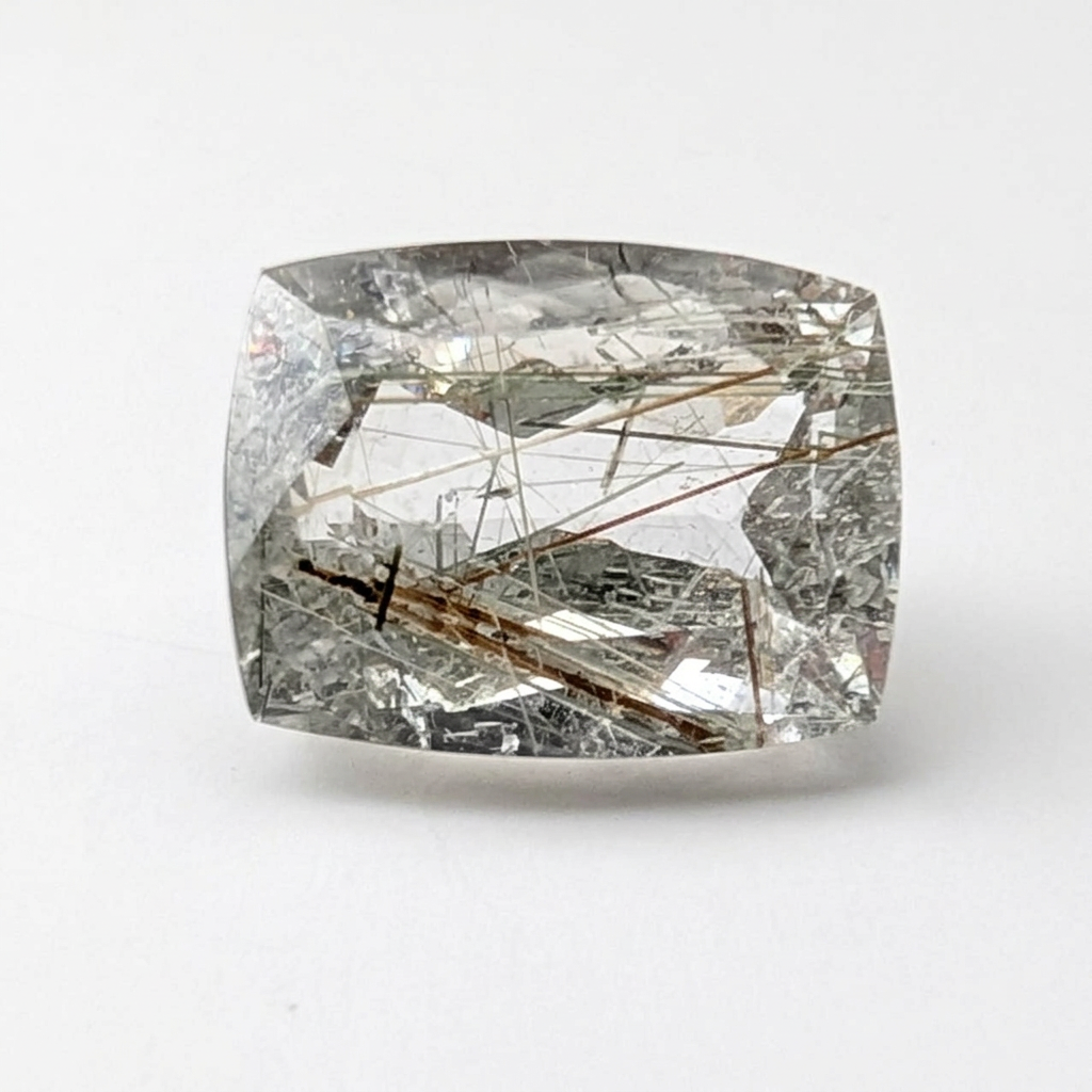 Actinolite quartz faceted cushion gemstone, 12.03ct, from Mount Breakenridge, Harrison Lake, BC, Canada, on a white background, view 1 of 12