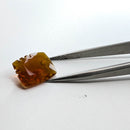Oregon fire opal faceted cushion fantasy cut gemstone, 4.06ct, held in tweezers, view 9 of 11
