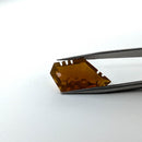 Oregon fire opal faceted freeform fantasy cut gemstone, 7.43ct, held in tweezers, view 2 of 13