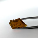 Oregon fire opal faceted freeform fantasy cut gemstone, 7.43ct, held in tweezers, view 13 of 13
