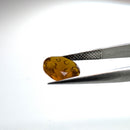 Oregon fire opal faceted round fantasy cut gemstone, 1.82ct, held in tweezers, view 10 of 11