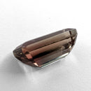 Oregon Sunstone faceted emerald cut gemstone, 2.39ct, from Plush, Oregon, on a white background, view 7 of 11