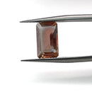 Oregon sunstone faceted emerald gemstone, 2.80ct, held in tweezers, view 11 of 11