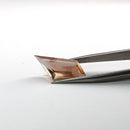 Oregon Sunstone faceted freeform step cut gemstone, 5.50ct, from Plush, Oregon, held in tweezers, view 3 of 8