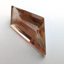 Oregon Sunstone faceted freeform step cut gemstone, 5.50ct, from Plush, Oregon, on a white background, view 5 of 8