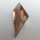 Oregon Sunstone faceted freeform step cut gemstone, 5.50ct, from Plush, Oregon, on a white background, view 7 of 8