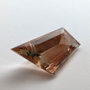 Oregon Sunstone faceted freeform step cut gemstone, 5.50ct, from Plush, Oregon, on a white background, view 8 of 8