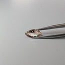 Oregon Sunstone faceted marquise cut gemstone, 1.49ct, from Plush, Oregon, held in tweezers, view 3 of 8