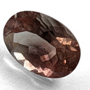 Oregon Sunstone faceted oval cut gemstone, 0.91ct, from Plush, Oregon, on a white background, view 4 of 11